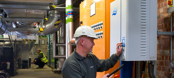 Condair technician working on a humidifier