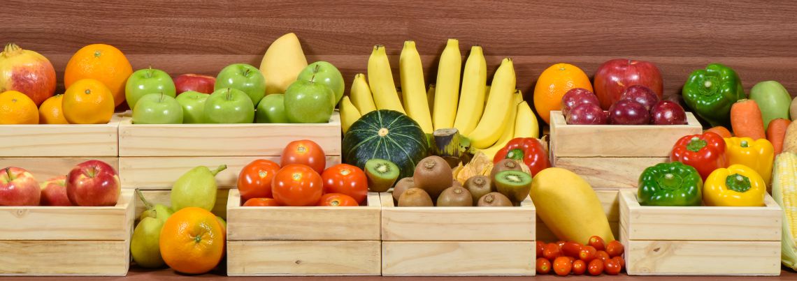 Wooden shelves with various fruits and vegetables